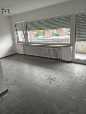 Renovierte Balkonwohnung im 1. OG mit Einbauküche, Keller und Gasheizung in Rhede – Heinestraße - Titelbild (63464)